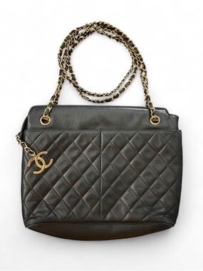 CHANEL Black Quilted Lambskin Leather Purse with Gold Hardware